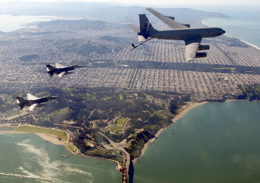OVER THE SAN FRANCISCO BAY -- Two F-16 Fighting Falcons move into a precontact position with a KC-135E Stratotanker before refueling during an Operation Noble Eagle training patrol March 16. The F-16s are assigned to the California Air National Guard's 144th Fighter Wing in Fresno and the KC-135E is assigned to the 940th Aerial Refueling Wing at Beale Air Force Base, Calif.  (U.S. Air Force photo by Master Sgt. Lance Cheung)