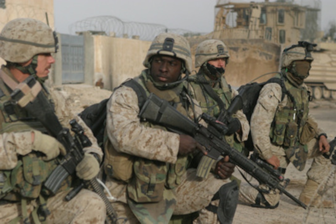 U S Marines Prepare To Step Off On A Patrol Through The City Of