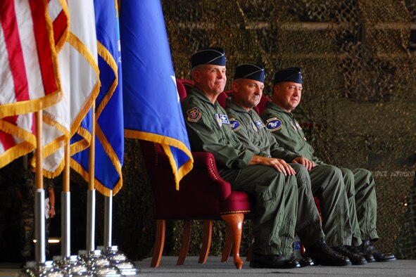 Lt. Gen. Steven G. Wood, 7th Air Force commander; Brig. Gen. Joseph Reynes, former wing commander and Col. Jon Norman new wing commander, participate in the change of command ceremony June 15 at Osan Air Base, South Korea. General Reynes passed on command of the 51st Fighter Wing to Colonel Norman. (U.S. Air Force photo/Airman 1st Class Chad Strohmeyer)