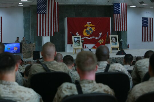 CAMP FALLUJAH, Iraq (August 16, 2008) - Service members from around Camp Fallujah came together Aug. 16 to honor Cpls. Adam T. McKiski and Stewart S. Trejo during a memorial service for the Marines who were killed Aug. 7. Both Marines belonged to Maintenance Company, Combat Logistics Battalion 1, 1st Marine Logistics Group and were well known for their hard-charging attitudes by their friends and coworkers. (Photo by Cpl. Tyler B. Barstow)