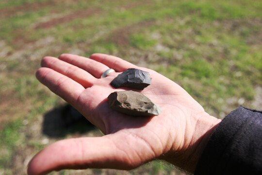Manipulated by civilizations years ago, rocks unearthed at San Mateo on Pendleton lie in the hand of Wayne J. Glenny, archeologist, EDAW, Inc., contracted through the Assistant Chief of Staff’s Environmental Security Office, Marine Corps Base Camp Pendleton.