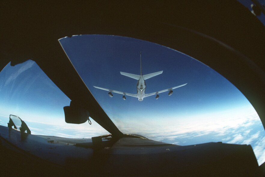 A view from the cockpit of a 495th Tactical Fighter Squadron F-111F aircraft as it approaches the refueling boom of a KC-135E Stratotanker aircraft of the 128th Air Refueling Group, Wisconsin Air National Guard, during Open Gate '89.  Open Gate is a Joint Chiefs of Staff/NATO exercise designed to simulate air and sea power tactics required to keep the Straits of Gibraltar open during a crisis. 