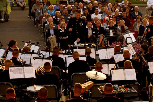 Marine Band San Diego performs a selection of music dedicated to local heroes during this year’s Summer Sunset Concert Saturday in front of Pendleton Hall. Company C recruits and 400 guests enjoyed the concert from the commanding general’s lawn.