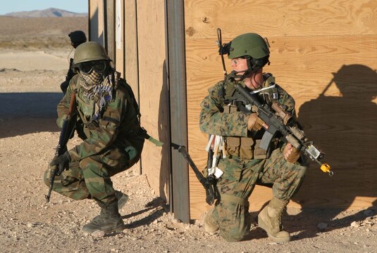 AL ASAD, Iraq (March 17, 2008) ?A landing-support specialist with Combat Logistics Battalion 6?s Helicopter Support Team connects the static wand to the CH-53E Super Stallion to ground the aircraft before rigging the external load.