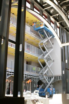 Workers stay busy to complete Camp Pendleton's $14.8 million Temporary Lodging Facility located near the front gate by June 1. The iconic structure will be 100 percent recyclable upon demolition and has employed hundreds despite economic concern.
