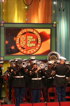 Marines from the 3rd Marine Aircraft Wing Band play "Anchors Away," the Navy's anthem, for the Veterans Day "Salute to the Military" episode of CBS's "The Price is Right," Aug. 11, in Los Angeles. The episode will air on CBS, Nov. 11.  (Official U.S. Marine Corps photo by Cpl. Christopher O'Quin)