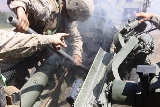 Marines with 1st Battalion, 11th Marine Regiment, prepare to fire the M777 Lightweight Towed Howitzer during traning operations on Camp Pendleton, Calif. Aug. 17. Two dozen M777 Lightweight Towed Howitzers and a number of High Mobility Artillery Rocket Systems have been generating a majority of the noise heard from Temecula to Carlsbad in past weeks.