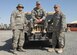 SOUTHWEST ASIA -- Staff Sgt's Wade Horstman (Cousin), Josh Horstman (Son) and Senior Master Sgt. Lee Horstman (Father), 386th Expeditionary Wing Civil Engineer Squadron, pose for a photo at an air base in Southwest Asia, Feb. 4. This is the first time that all three relatives have been deployed to the same location from the 114th Fighter Wing guard unit at Foss Field, S.D.(U.S. Air Force photo/Senior Airman Courtney Richardson)