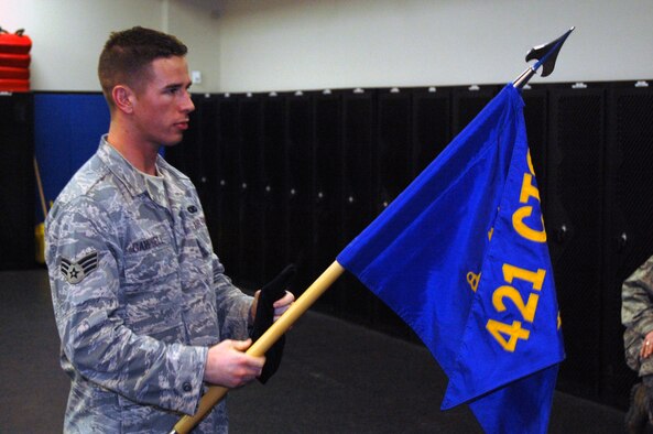 A student in the Air Force Phoenix Raven Training Course, carries the Raven flag during a training session on Feb. 19, 2009, in the U.S. Air Force Expeditionary Center on Fort Dix, N.J.  The Raven course, taught by the USAF EC's 421st Combat Training Squadron, teaches security forces Airmen specialized training in aircraft security, combatives and verbal judo to name a few.  (U.S. Air Force Photo/Tech. Sgt. Scott T. Sturkol)