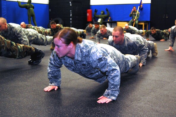 Students in the Air Force Phoenix Raven Training Course participate in a physical training session on Feb. 19, 2009, in the U.S. Air Force Expeditionary Center on Fort Dix, N.J.  The Raven course, taught by the USAF EC's 421st Combat Training Squadron, teaches security forces Airmen specialized training in aircraft security, combatives and verbal judo to name a few.  (U.S. Air Force Photo/Tech. Sgt. Scott T. Sturkol)