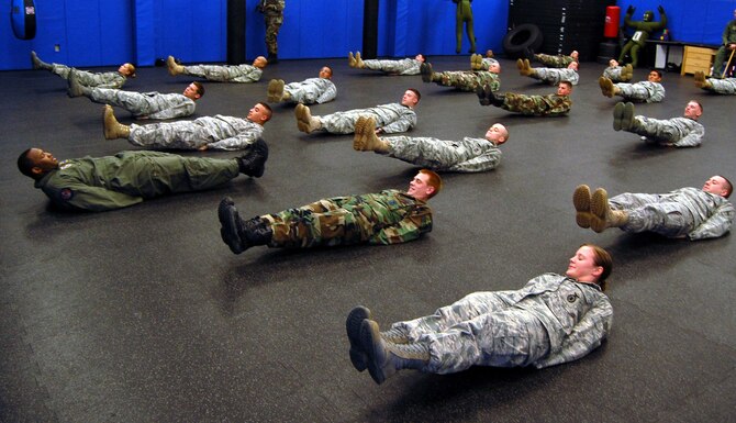 Students in the Air Force Phoenix Raven Training Course participate in a physical training session on Feb. 19, 2009, in the U.S. Air Force Expeditionary Center on Fort Dix, N.J.  The Raven course, taught by the USAF EC's 421st Combat Training Squadron, teaches security forces Airmen specialized training in aircraft security, combatives and verbal judo to name a few.  (U.S. Air Force Photo/Tech. Sgt. Scott T. Sturkol)