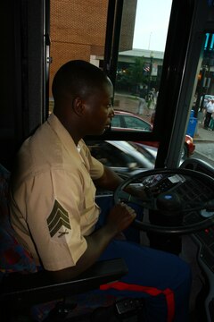 Sgt. Willie Terrell shuttles guests to the Evening Parade at Marine Barracks Washington, July 10. Terrell is the platoon sergeant for the Motor Transport Section, which is responsible for transporting Marines and their guests to thousands of events and ceremonies each year.