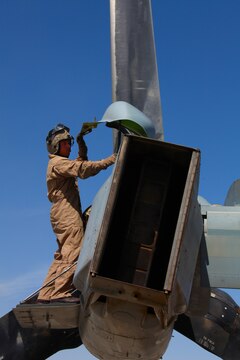 Staff Sgt. John Godwin, a Loxley, Ala., native serving as a flight equipment technician and aerial observer with Marine Medium Tiltrotor Squadron 261, 3rd Marine Aircraft Wing (Forward), here, makes a few final checks on the MV-22 Osprey he's going to fly on before setting off for the day's missions, April 24.