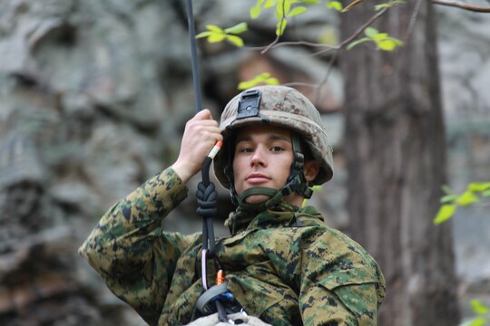 Cpl. Jared Reutter, a team leader with Company K, Battalion Landing Team 3/8, 26th Marine Expeditionary Unit  is lowered off a cliff during a class at the Assault Climbers Course at Lower Cliff in Kingwood, W.Va., April 26, 2010. The class learned different techniques for moving themselves and others quickly over man-made and natural occurring objects. The Assault Climbers Course is one of several Special Operations Training Group, II Marine Expeditionary Force events as part of 26th MEU's preparation for deployment this fall. (Official USMC photo by Staff Sgt. Danielle M. Bacon) ::r::::n::