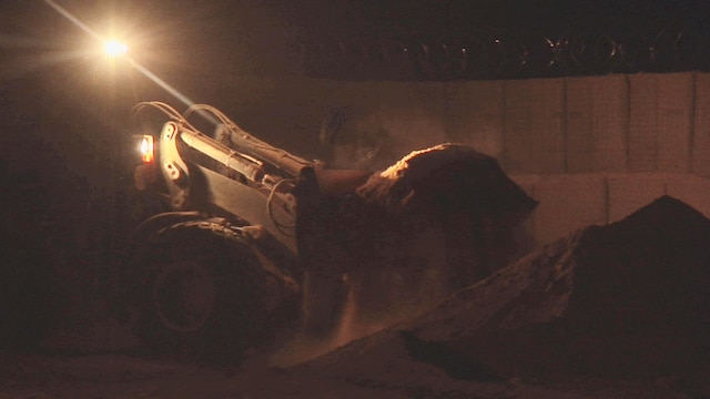 A Marine with 9th Engineer Support Battalion operates a bulldozer to fill Hesco barriers as part of a project to construct a combat outpost in Marjah, Afghanistan, Aug. 16. Marines constructed a perimeter, established an entry control point and built guard towers. The new outpost will give the Afghan policemen with the Afghan Uniformed Police an area of their own to conduct security operations independent from coalition forces.