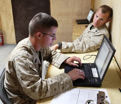 Seaman Blake Hargis, a corpsman with the Concussion and Injury Recovery Center, fills out a traumatic brain injury questionnaire for Sgt. Denver Owens, an electrician with 3rd Combat Engineer Battalion, 1st Marine Division, at Camp Leatherneck, Afghanistan, Aug. 26. The newly-opened concussion center opened Monday and was developed to aid in the treatment of concussions