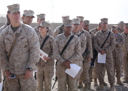 More than 100 anxious service members waited in line to meet and take photos with actor Mark Wahlberg during his visit at Camp Leatherneck, Afghanistan, Dec. 19. Wahlberg shook hands and took pictures with the troops, while thanking them for their service.