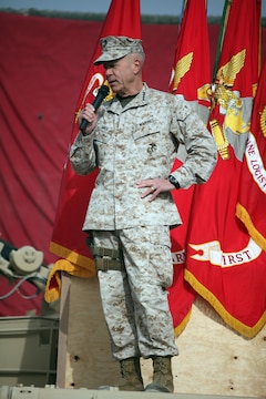 Commandant of the Marine Corps, Gen. James F. Amos addressed a crowd of Marines and sailors at Camp Leatherneck, Afghanistan, Dec. 23.  Amos expressed his admiration to the service members for their accomplishments and dedication to supporting the ongoing counterinsurgency mission, especially while deployed during the holiday season.