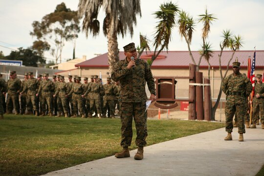 Sgt. Maj. Steven J. Lara speaks to Marines and sailors of the 1st Marine Logistics Group before passing his responsibilities over to Sgt. Maj. Antonio N. Vizcarrondo Jr., during 1st MLG's relief and appointment ceremony here, Jan. 29. Lara has served as the acting 1st MLG Sergeant Major since February 2007.