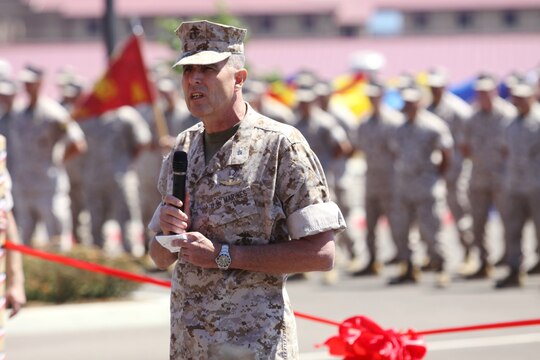 Col. Stephen W, Davis, deputy commander, Marine Special Operations Command, U.S. Special Operations Command, speaks at 1st Marine Special Operation Battalion's change-of-command and ribbon cutting ceremony at Camp Pendleton, July 13. Command of Camp Pendleton’s 1st MSOB changed hands as Lt. Col. Jeffrey D. Tuggle relinquished responsibility for the unit to Lt. Col. Michael A. Brooks during the two-hour ceremony. In addition to new leadership, the battalion also opened their recently built 33-acre complex and six different training facilities during the two-hour ceremony.