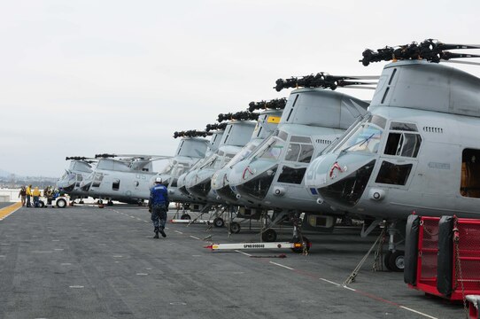 Several CH-46E "Sea Knights" with Marine Medium Helicopter Squadron 165 (Reinforced) are staged on the flight deck of the USS Peleliu May 17, 2010. HMM-165 (Rein) departs May 20, 2010, to the Western Pacific for a seven-month deployment with the 15th Marine Expeditionary Unit.