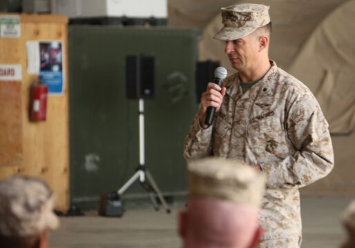 Lt. Col. John Bolt, the commanding officer of Marine Fighter Attack Squadron 122, 3rd Marine Aircraft Wing (Forward), gives a short speech during a transfer of authority ceremony held at Kandahar Air Field, Afghanistan, Nov. 20.  VMFA-232 relinquished their area of responsibility to VMFA-122, after having supported coalition forces in Helmand and Nimroz provinces for the past six months.