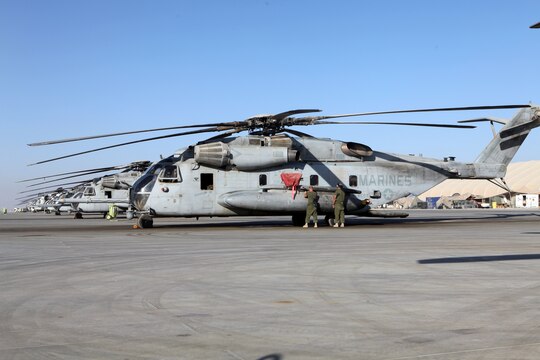 CH-53E Super Stallions with Marine Heavy Helicopter Squadron 361 (-) (Reinforced) line the flightline here ready to support International Security Assistance Forces operations within the region.  Being the only CH-53E squadron with 3rd Marine Aircraft Wing (Forward), the squadron was reinforced with additional manpower from HMH-466.  Together, under the HMH-361 (-) (Rein) flag, the squadron’s 17 aircraft have transported more than 4.5 million pounds of cargo, 26,000 personnel and flown more than 3,100 flight hours since they arrived here Aug. 1.