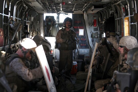 Cpl. Kyle Greer, a CH-53D crew chief with Marine Heavy Helicopter Squadron 362, 3rd Marine Aircraft Wing (Forward), ensures all passengers are seated before take off during Operation Stargey Oct. 17.  Greer and four other HMH-362 Marines received their combat aircrew wings from Brig. Gen. Andrew W. O'Donnell Jr., the 3rd MAW (Fwd) commanding general, at the flightline aboard Camp Bastion, Afghanistan, Dec. 6.  The combat aircrew wings must be earned while the unit is deployed.  It is a prestigious distinguishing device as it is symbolic of Marine aviation’s deep bond and commitment to supporting the infantry and coalition forces in Afghanistan.