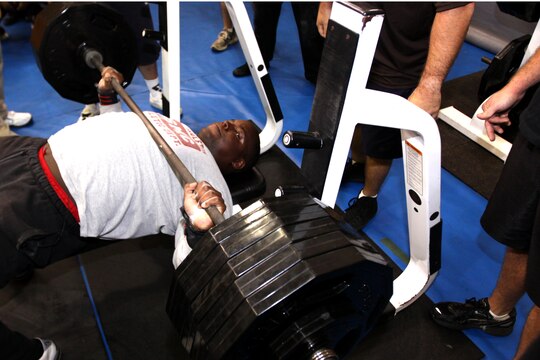 Cpl. David L. Douglas, automotive organizational mechanic, 1st Maintenance Battalion, 1st Marine Logistics Group bench presses over 450 pounds at the final competition of the Camp Pendleton 2010 Bench Press Challenge Series, hosted at the 52 Area Fitness Center, Oct. 22. Douglas has been trained by Master Sgt. Michael A. Green, maintenance control chief, Marine Helicopter Light Attack Squadron 469, 3rd Marine Air Wing, and overall winner of the event. Douglas will be on temporary orders to Great Britain for a worldwide competition.