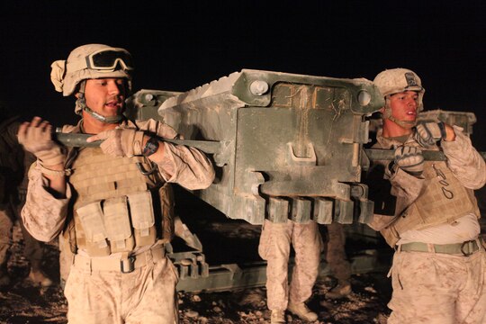 Marines with Bridge Platoon, Company A, 9th Engineer Support Battalion, 1st Marine Logistics Group (Forward), removed an old double story medium girder bridge during a bridge replacement project in Marjah, Afghanistan, Oct. 23. The Marines removed an old medium girder bridge and replaced it with a newer one, to be used by coalition forces and local nationals.