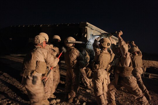 Marines with Bridge Platoon, Company A, 9th Engineer Support Battalion, 1st Marine Logistics Group (Forward) install a 4-bay double story medium girder bridge in Marjah, Afghanistan,  Oct. 23. The Marines removed an old medium girder bridge and replaced it with a newer one, to be used by coalition forces and local nationals.