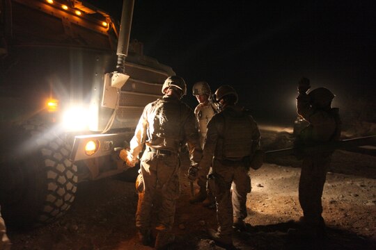 Marines with Bridge Platoon, Company A, 9th Engineer Support Battalion, 1st Marine Logistics Group (Forward), install a 4-bay double story medium girder  bridge in Marjah, Afghanistan, Oct. 23. The Marines removed an old double story bridge that had been there more than a year and replaced it with a newer medium girder bridge, to be used by coalition forces and local nationals.