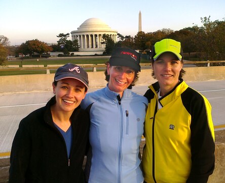 Captain Pauleen Stevens (center) of Life Cycle Logistics stops during the Marine Corps Marathon’s 10K race to pose in front of the Thomas Jefferson Memorial with Quantico friends Captain Susan Kilpatrick (left) and Major Marlene Hunt.
