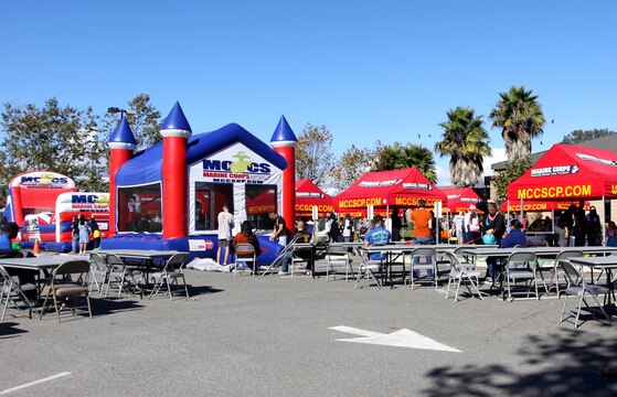 Families gather at Camp Pendleton's Blinder Memorial field to attend base's third annual Harvest Festival, Oct. 30. The event, hosted by the base chaplain's office, gave Marines, sailors and their families a chance to experience a safe and fun affair. The free event catered to more than 200 attendees and allowed participants to enjoy activities while showing off their best Halloween costumes.