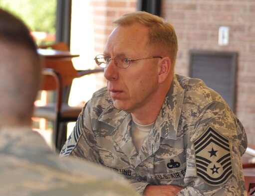 Chief Master Sgt. <b>Joseph Westerlund</b> listens as Col. - 100911-F-0414C-008