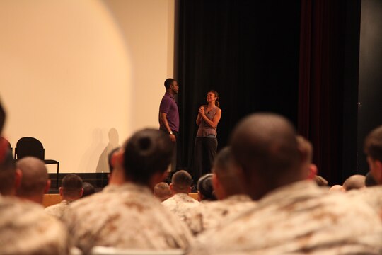Marines and sailors watch as actors in the play ‘Sex Signals’ go through various sexual assault-related scenarios at Camp Pendleton, Calif., April 26. Sex Signals is an improv-based play with two actors, a guy and a girl, who aim to teach service members about sexual assault prevention. The crowd participated by providing settings, pick-up lines, asking and answering questions for the show. The play touched on subjects such as sexual assault, consent and rape.