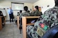 Afghan air force firefighting students at Pohantoon-e-Hawayee, the AAF’s “Air University,” listen to their instructor as he teaches them about fire safety recently. PeH is located on the AAF compound in Kabul and currently has 593 students enrolled from all over Afghanistan in various classes and is the primary in-processing point for all training conducted in the AAF. (U.S. Air Force photo by Staff Sgt. Matthew Smith)