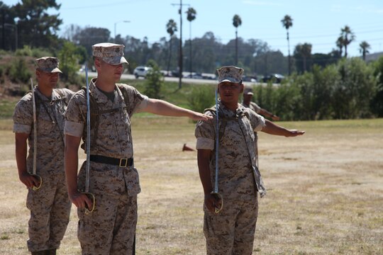 Marines with 1st Marine Logistics Group perform the command “dress, right, dress” during the close-order drill portion of the Combat Logistics Regiment 17 Corporals’ Course at Camp Pendleton, Calif., Aug. 17. The corporals attending the course learned basic leadership skills needed to lead the Marines under their charge. They also learned small-unit leadership, Marine Corps common skills, sword manual and other Marine Corps knowledge.