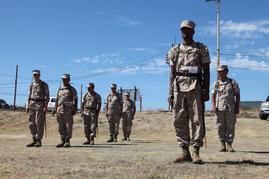 Marines with 1st Marine Logistics Group stand at the position of attention during the close-order drill portion of the Combat Logistics Regiment 17 Corporals’ Course at Camp Pendleton, Calif., Aug. 17. The corporals attending the course learned basic leadership skills needed to lead the Marines under their charge. They also learned small-unit leadership, Marine Corps common skills, sword manual and other Marine Corps knowledge.