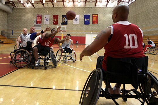 Injured Veteran Marines compete in the wheelchair basketball portion of the 2011 Marine Corps Trials at Camp Pendleton’s Paige Field House, Feb. 24. The trials are intended to select the top 50 Marine athletes to compete in the Wounded Warrior Games as the All-Marine team for the Paralympics-style competition slated for May 2011.