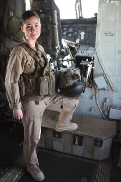 Navy Lt. Sarah Ballard stands aboard a CH-53D Sea Stallion with the Marine Heavy Helicopter Squadron 362 “Ugly Angels,” 3rd Marine Aircraft Wing (Forward), at Camp Bastion, Afghanistan, Jan 17. Ballard, the squadron’s flight surgeon who recently received the Richard Luehrs Memorial Award as the operational flight surgeon of the year, often volunteers to fly during combat missions as an aerial observer and on-call casualty evacuation doctor.
