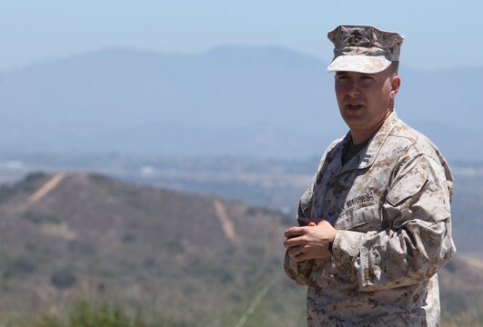 Capt. Jason Kikta, company commander, Communications Company, Combat Logistics Regiment 17, 1st Marine Logistics Group, gives a few remarks to distinguished guests during a change of command ceremony at Camp Pendleton, Calif., July 21. Kikta, 33, from Hanover, Ind., said he looks forward to leading the Marines of Comm. Co. as they prepare to deploy in support of Operation Enduring Freedom.