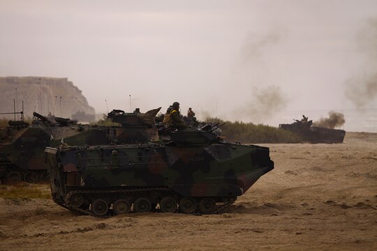 More than 550 Marines from 4th Assault Amphibian Battalion reserve unit came to Camp Pendleton’s Red Beach as part of their annual training exercises to practice amphibious assault tactics, July 26. The mission included forcible entry on the shoreline, transporting weapon systems, equipment, cargo and personnel while performing assault scenarios utilizing the Marine Air/Ground Task Force.