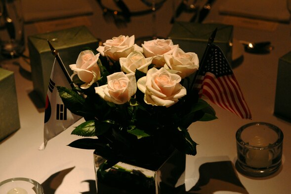 SEOUL, Republic of Korea -- A bouquet of flowers with Korean and American flags strategically placed together were the center pieces for the tables at the 20th Annual Korea America Friendship Night here June 30. (U.S. Air Force photo/Senior Airman Benjamin Stratton)