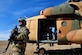 Master Sgt. Gary Hasecuster, 838th Air Expeditionary Advisory Group security forces adviser, covers his sector during an emergency resupply in western Afghanistan, Nov. 11, 2011. The U.S. and Afghan flight crews provided supplies to a remote Afghan Border Patrol outpost. The 838th AEAG Airmen advise Afghan soldiers on maintenance, operations, flight, and security of the Mi-17 helicopter. Hasecuster is deployed from  Joint Base McGuire-Dix-Lakehurst, N.J., and a native of Indianapolis. (U.S. Air Force Photo/SrA Tyler Placie)