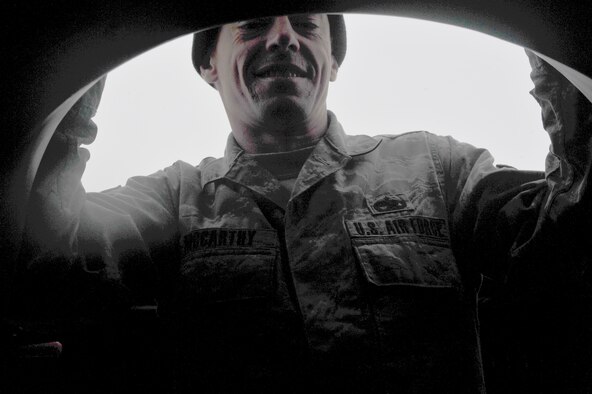 Tech. Sgt. Keith McCarthy, 838th Air Expeditionary Advisory Group, Detachment 1, maintenance air adviser climbs atop an Mi-17 helicopter during preflight checks before a training flight over Herat City, Afghanistan, Nov. 10, 2011.The 838th AEAG Airmen advise Afghan soldiers on the maintenance, operations, and security of the Mi-17 helicopter. McCarthy is deployed from the 723th Aircraft Maintenance Squadron at Moody AFB, Ga. (U.S. Air Force Photo/SrA Tyler Placie)