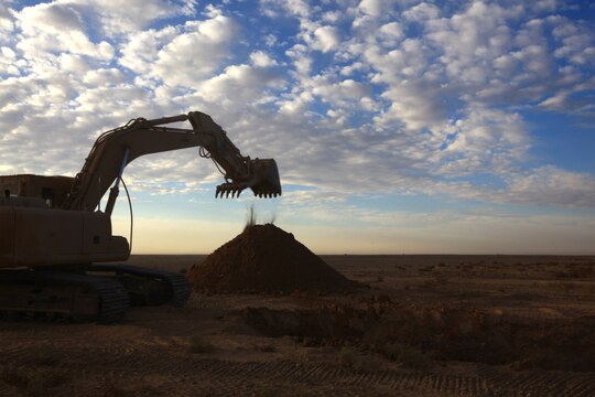 A Marine with Combat Logistics Battalion 1, 2nd Marine Logistics Group (Forward), operates a construction vehicle at a worksite in Helmand province, Afghanistan, Nov. 22.  CLB-1 is currently constructing Route Victoria to connect districts in the so Helmand can remain open for business. (U.S. Marine Corps photo by Cpl. Katherine M. Solano)