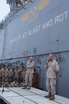 A construction vehicle, operated by Marines with Combat Logistics Battalion 1, 2nd Marine Logistics Group (Forward), drives across a worksite in Helmand province, Afghanistan, Nov. 22. The Marines with CLB-1 will spend the next several weeks building Route Victoria to connect districts in the area. (U.S. Marine Corps photo by Cpl. Katherine M. Solano)