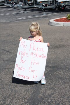 A family member waits for her loved on who participated in the Ride for Semper Fi, a 430-mile bicycle ride from Scottsdale, Ariz. to  Marine Corps Recruit Depot San Diego at the Bay View Restaurant Oct. 15. The Ride for Semper Fi is an annual event that helps raise money for the Injured Marine Semper Fi Fund, which assists service members and their families with hospital bills and recovery assistance.