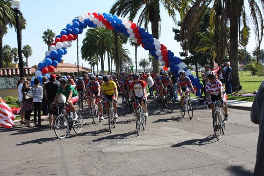 Sixty-five riders participating in the Ride for Semper Fi cross the finish line at the Bay View Restaurant aboard Marine Corps Recruit Depot San Diego Oct. 15. The Riders spent five months in a rigorous training regime that had them riding over 2,000 miles, to prepare for the 430-mile, 4-day bicycle ride.